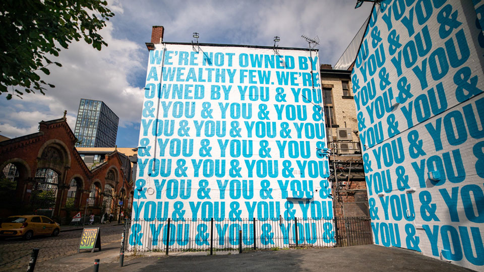 Co-Op mural on a wall