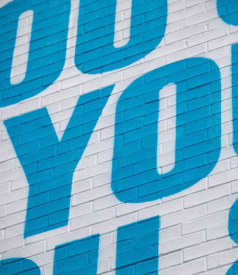 Co-Op mural on a wall