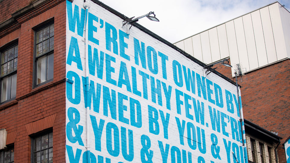 Co-Op mural on a wall