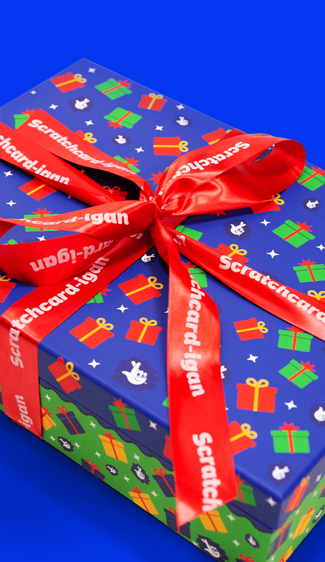 Gift box wrapped with red ribbon