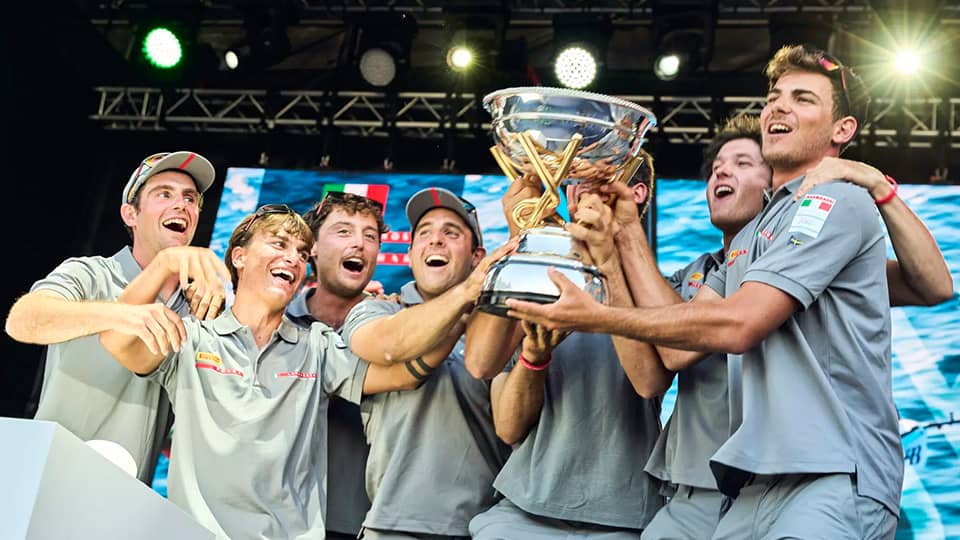 Team celebrating with a trophy